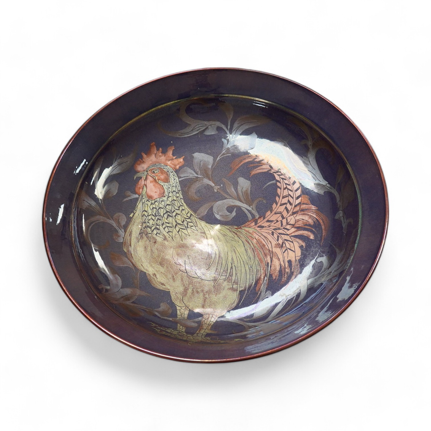 A Jonathan Chiswell Jones lustre dish decorated with a cockerel, 42.5cm diameter. Condition - good
